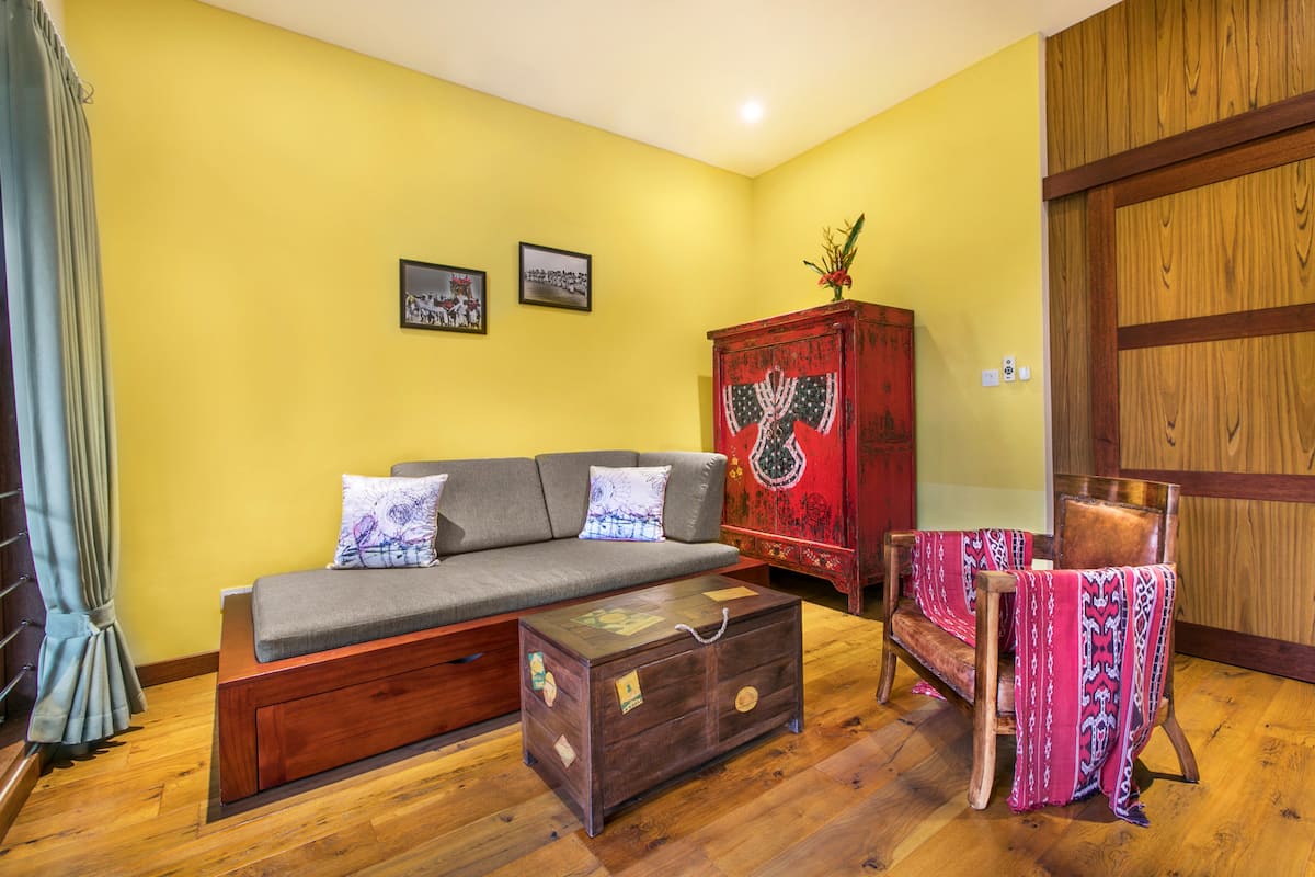 Upper living room when not converted to sleeping room with beautiful view
over the rice fields