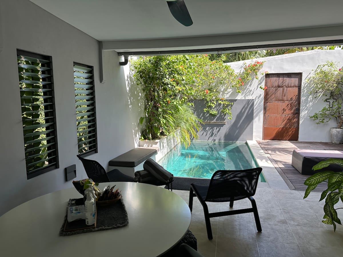 Looking into the pool from the outdoor kitchen area.