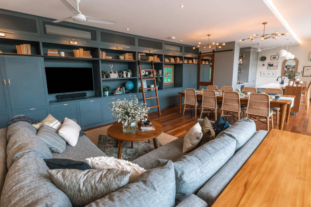 Large living area for 8 - you can leave open with ceiling fans or close and put on the air conditioning Includes library full of books, smart TV with Netflix, Spotify & Prime Video, sound bar, guest toilet, dining, kitchen